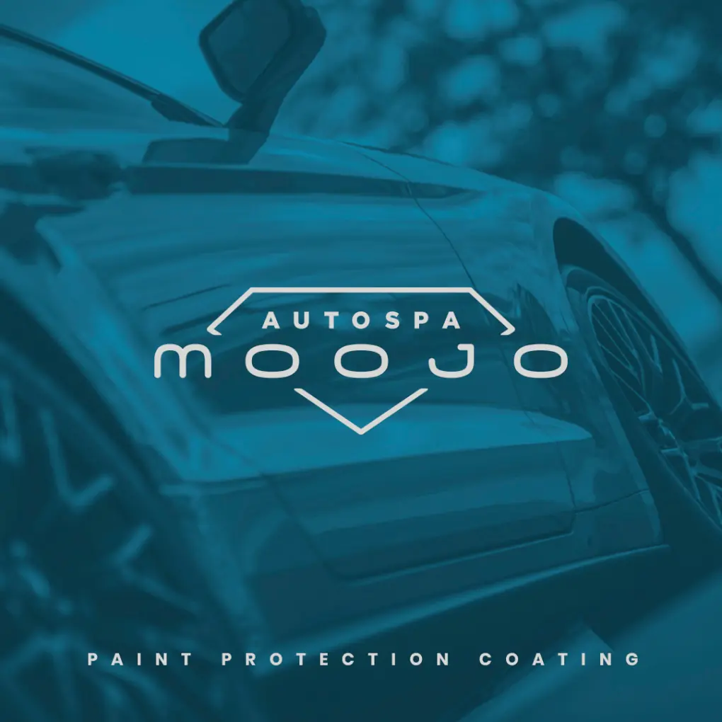 Blue sports car in Moojo Auto Spa garage