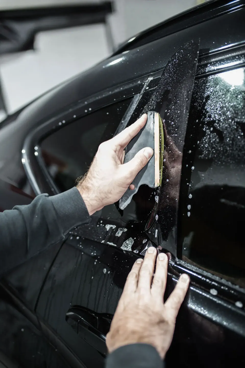 Service de teinte de vitres chez Moojo Auto Spa